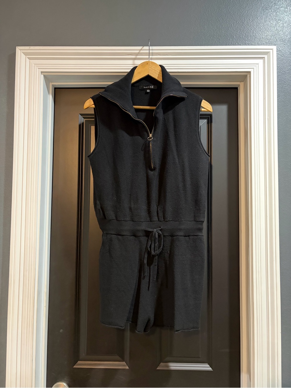 Sleeveless Black Zip-Neck Romper with Tie Waist